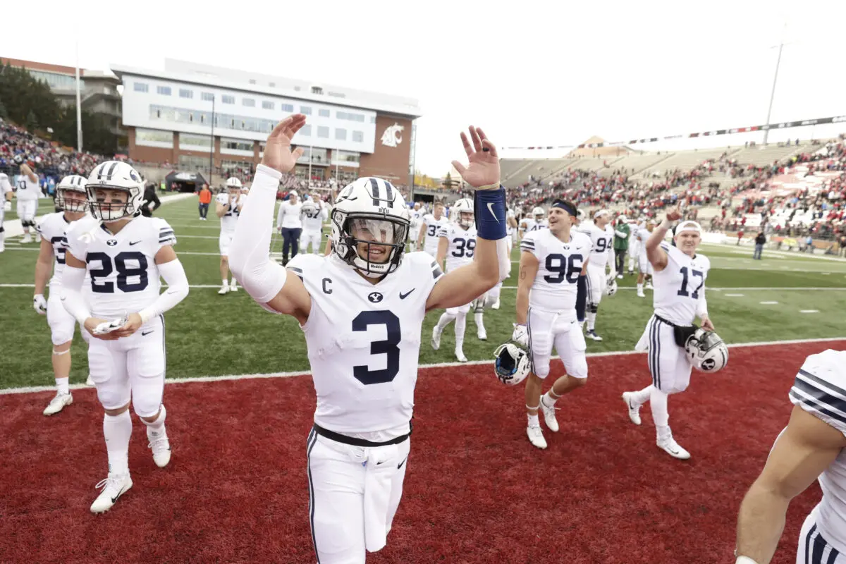 BYU sophomore quarterback Jaren Hall waves to fans after the 21-19 BYU win over Washington State at Martin Stadium in Pullman, Wash., on Saturday, Oct. 23, 2021. (Jaren Wilkey, BYU Photo)